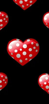 This is a charming live phone wallpaper featuring a cluster of red hearts arranged artistically on a black background