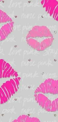 This phone live wallpaper features a stylish pattern of pink lipstick against a sleek gray background, perfect for adding a touch of glamour to your phone's customization