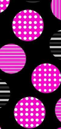 This live phone wallpaper features a vibrant pink and white polka dot pattern on a sleek black background
