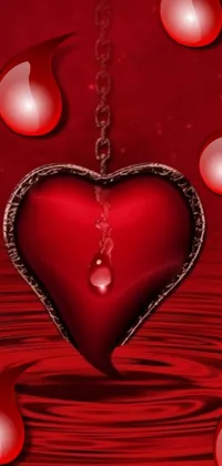 This stunning live wallpaper features a vibrant red heart in the center surrounded by delicate water droplets