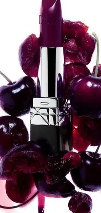 Transform your phone screen with a stunning live wallpaper – a captivating close-up of a lipstick surrounded by cherries
