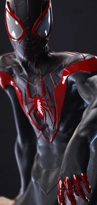 The Spider-Man live phone background showcases a 3D statue of the iconic superhero