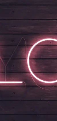 Transform your phone screen with this stunning neon sign live wallpaper that showcases the word "love" against a wooden wall