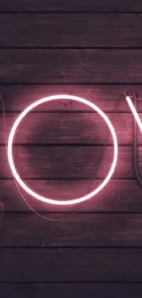 This stunning live wallpaper features a striking neon sign reading 'love' displayed on a wooden wall