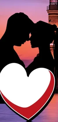 This phone live wallpaper depicts a romantic scene of two people kissing in front of a lighthouse, with heart machines connecting them in silhouetted outlines