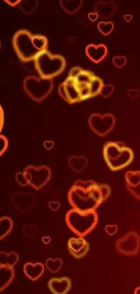 Looking for a romantic and visually appealing phone live wallpaper? Look no further! This trendy wallpaper features numerous hearts on a glossy, red background with stunning orange and red lighting