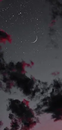 This live phone wallpaper shows a night sky with a crescent and stars on an aesthetic gray black white and red noir background