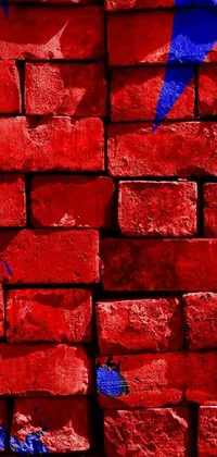 This phone live wallpaper showcases a red fire hydrant in front of a brick wall with a digital rendering