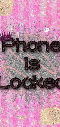 This live wallpaper portrays a regal crown on a locked phone with a background of glamorous pink hues
