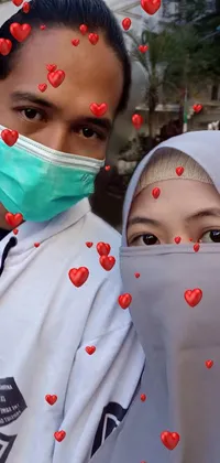 This live wallpaper features a scene of a man and a woman both wearing face masks