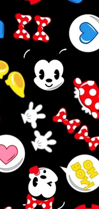 Decorate your phone screen with a fun live wallpaper featuring a mickey mouse pattern on a black background