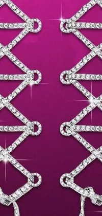 This phone live wallpaper showcases a stunning pair of diamond laces set against a rich purple background