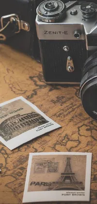 Experience a vintage delight with this phone live wallpaper! Featuring a classic camera atop a detailed map, a beautiful polaroid photo, and vibrant art photography, this wallpaper showcases the beauty of travel seamlessly