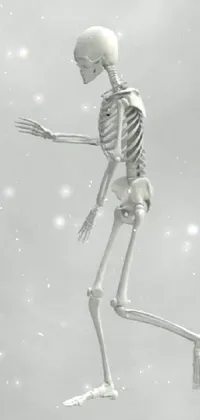 This phone live wallpaper features a captivating skeleton dancing in a snow-covered scene