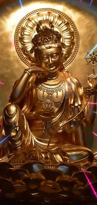 This live wallpaper features a golden buddha statue on a golden plate