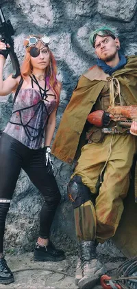This live phone wallpaper depicts a woman and man dressed in post apocalyptic attire, wearing WW1-style gas masks