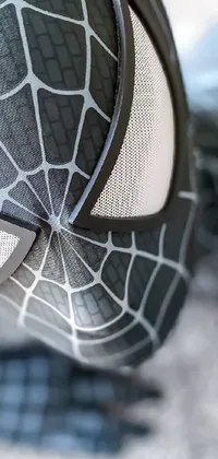 If you're looking for a stunning animated wallpaper for your phone, then you'll love this close-up shot of Spider-Man in a Spidey suit