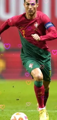 This phone live wallpaper depicts a scene of a man running energetically towards a soccer ball on a verdant green field, surrounded by a lively crowd of soccer fans