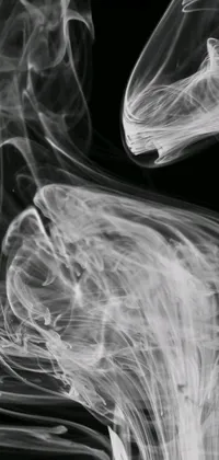 This phone live wallpaper showcases a mesmerizing close-up of smoke against a black background