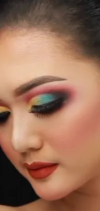 Introducing a stunning phone live wallpaper featuring a woman's colorful makeup