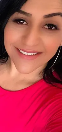 This stunning phone live wallpaper features a beautiful Latina woman with a gorgeous smile and a striking pink shirt