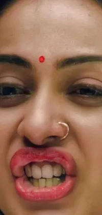 This dynamic phone live wallpaper features a striking close-up shot of a person wearing a nose ring