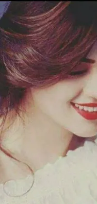 This live wallpaper showcases a stunning close-up portrait of a woman smiling joyfully