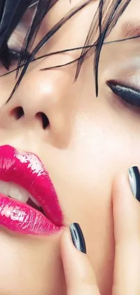 This phone live wallpaper showcases a close-up of bold red lips with a mirror's edge style