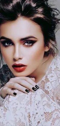 This phone live wallpaper features a woman in a white dress, a black lace dress with heavy eye makeup, a short-haired androgynous girl in a leather jacket smoking a cigarette, and other beautiful women in diverse styles