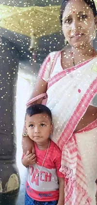 This charming live wallpaper showcases a delightful image of a woman standing beside an adorable child, who appears to be captivated by a picture or photo