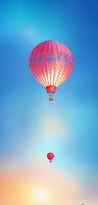 This phone live wallpaper features a digital rendering of a hot air balloon flying over a body of water