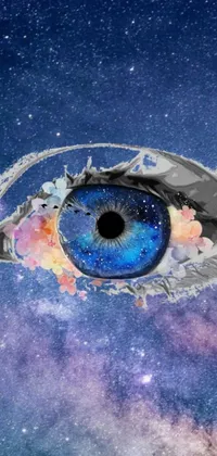 This phone live wallpaper features a detailed close-up of an eye with a surreal sky background