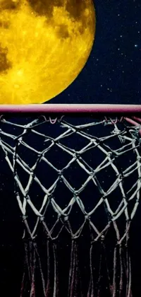 This stunning live wallpaper depicts a breathtaking painting of a basketball net in front of a full moon, creating a dreamlike atmosphere