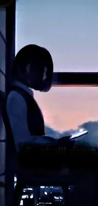 Enjoy a beautiful live wallpaper of a person sitting in a chair, gazing out a window