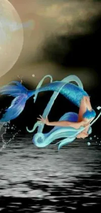 Transform your smartphone with this enchanting live wallpaper of a mermaid jumping out of the water during a full moon night