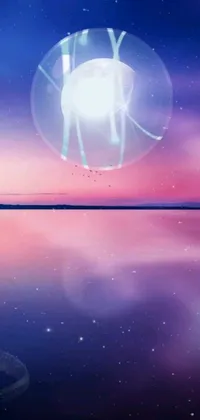 This phone live wallpaper depicts a serene jellyfish floating on calm waters at a purple sunset