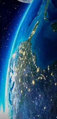 This phone live wallpaper showcases a stunning view of the Earth from space at night