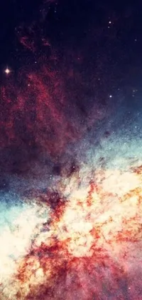 This phone live wallpaper features a stunning galaxy backdrop with stars and nebulas in a blue and white color scheme, perfectly complemented by red mist clouds