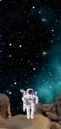 This phone live wallpaper features an awe-inspiring digital art of an astronaut standing on a rocky hill against a cosmic background, perfect for space enthusiasts