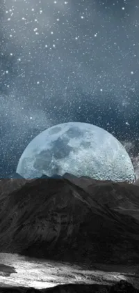 This stunning live wallpaper for your phone features a black and white photo of a full moon set against a digital art collage
