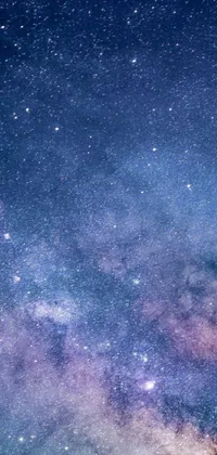 This live wallpaper showcases a stunning night sky with a multitude of sparkling stars