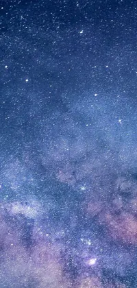 Looking for an out-of-this-world live phone wallpaper? Look no further than this stunning night sky design
