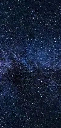 This live wallpaper for your phone displays a breathtaking night sky filled with countless stars