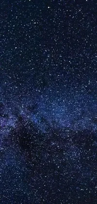 This stunning live wallpaper boasts a night sky filled with twinkling stars against a dark blue backdrop