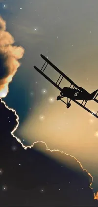 This phone live wallpaper showcases an antique biplane flying through a cloudy sky against a stunning sunset backdrop