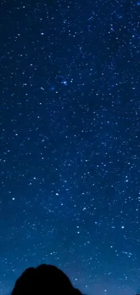 Experience the magic of the night sky right on your iPhone 15 background with this stunning live wallpaper
