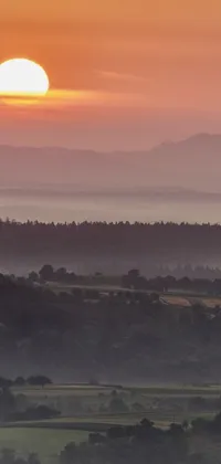 Immerse yourself in the natural beauty of this sunset Phone Live Wallpaper