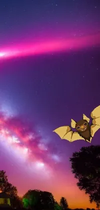 This live phone wallpaper features a majestic bat soaring through a surreal galaxy in the background