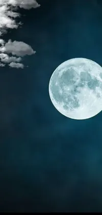 Experience the beauty of a full moon live wallpaper with clouds as the background