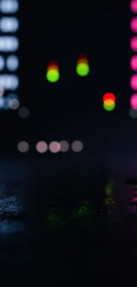 Create an engaging phone live wallpaper with a blurry city image at night